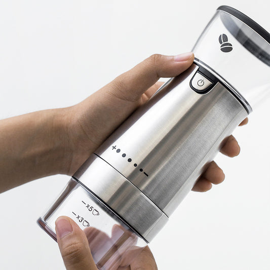 GrindCraft stainless steel electric burr coffee grinder grinding whole beans into grounds