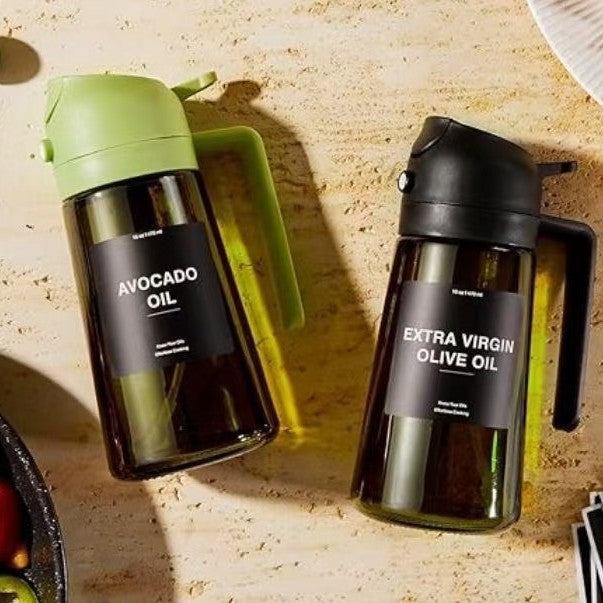 MistPour 2-in-1 glass bottle spraying fine oil mist onto cooking ingredients