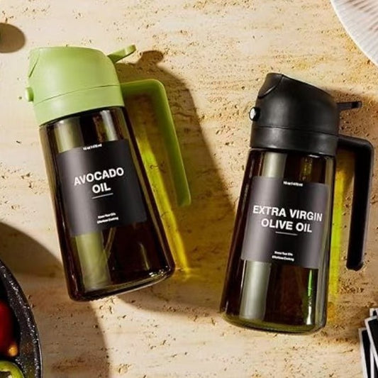 MistPour 2-in-1 glass bottle spraying fine oil mist onto cooking ingredients